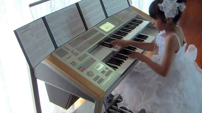 Little Girl Plays <i>Back To The Future</i> Theme