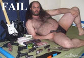 Fat hairy man in a speedo with guns and Guitar Hero controllers