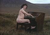Nude Piano Player
