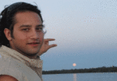Can You Please Photoshop The Sun Between My Fingers?