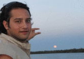 Can You Please Photoshop The Sun Between My Fingers?