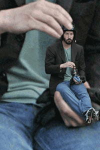 Sad Keanu in a Helmet