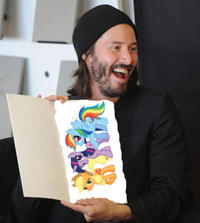 keanu-reeves-book-signing-06192011-lead-ponies.jpg