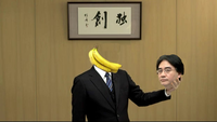 Satoru Iwata Holding Bananas