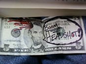 Boom_headshot_dollar
